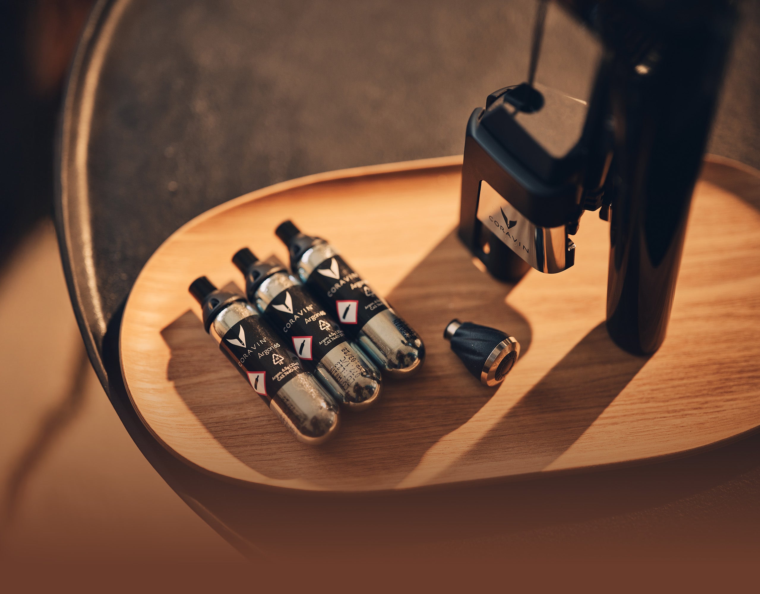 Argon capsules on a wooden tray